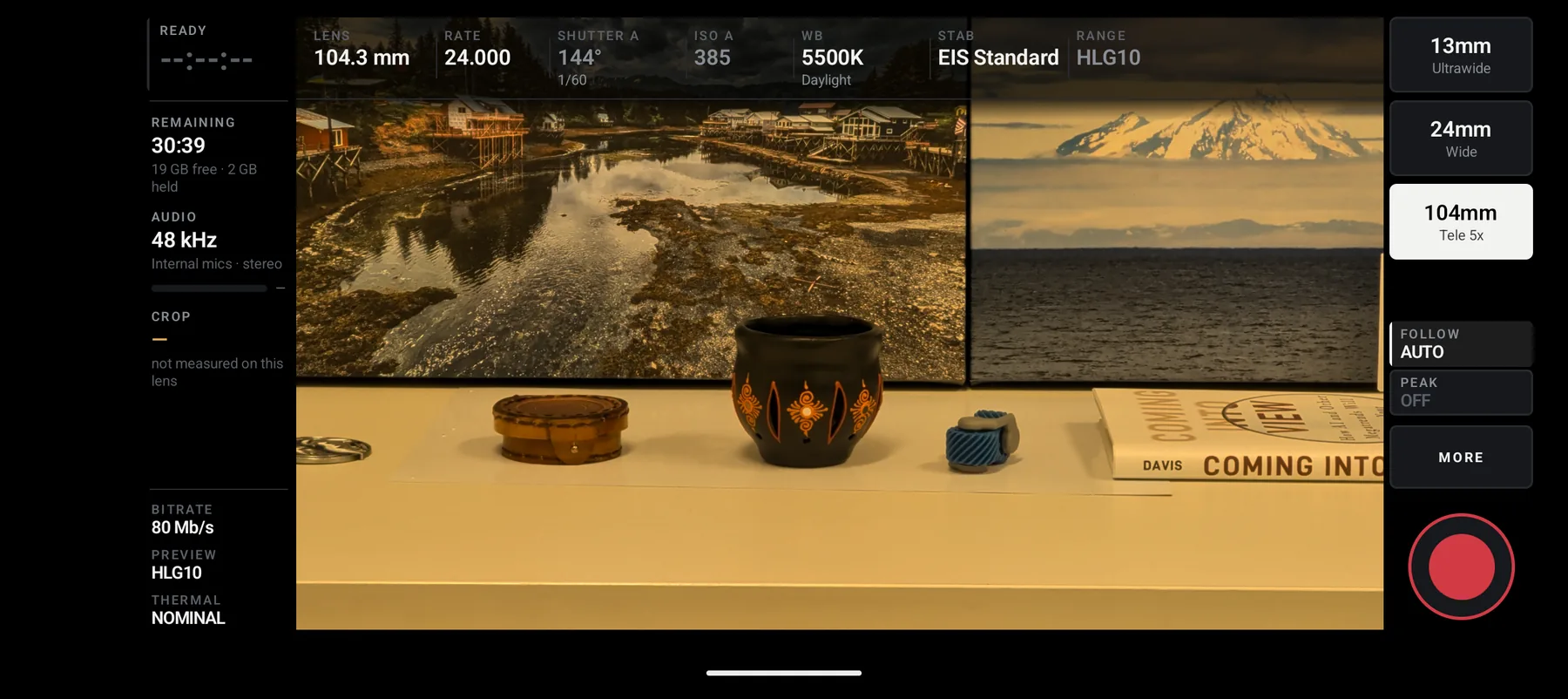 The tele lens selected: the top strip reads LENS 104.3 mm, SHUTTER 144 degrees,
                  ISO 394, and the left column reads CROP — not measured on this lens.
